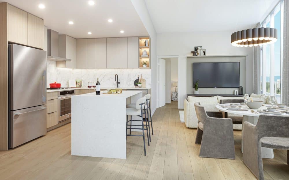 Interior rendering of a modern condominium kitchen and dining area at Kadence Coquitlam by Ledingham McAllister located at 1175 Pipeline Road in Coquitlamโs New Horizons neighbourhood. The home features a large kitchen island with bar seating