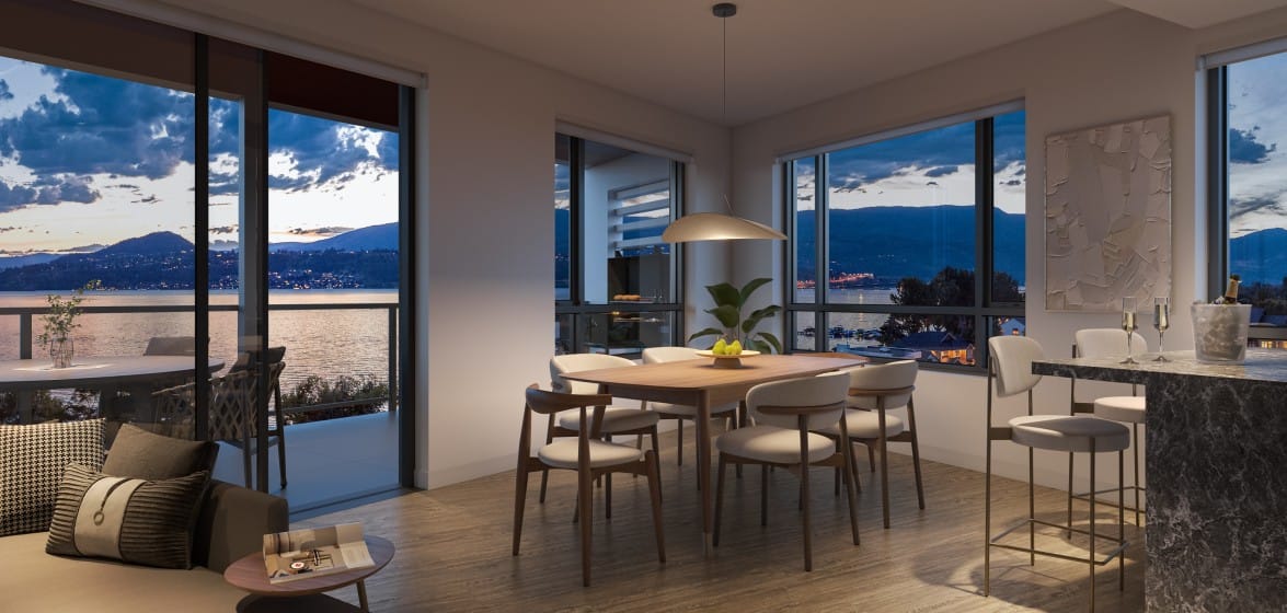 Dining area at Alma Kelowna with evening lake views overlooking Pandosy Waterfront Park from 3051 Abbott Street.
