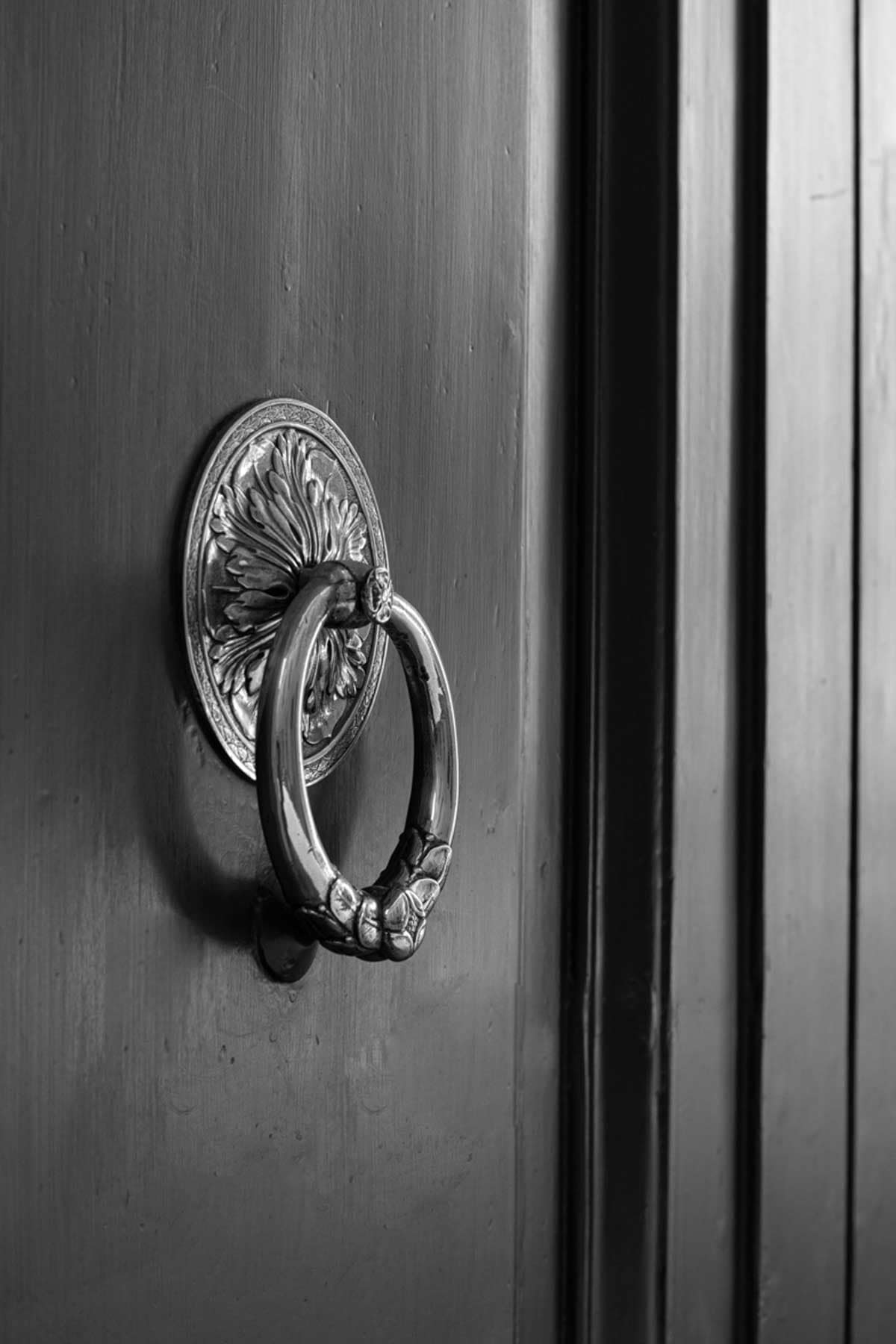 Elegant door knocker symbolizing trust and welcoming service at Vancouver Real Estate Group