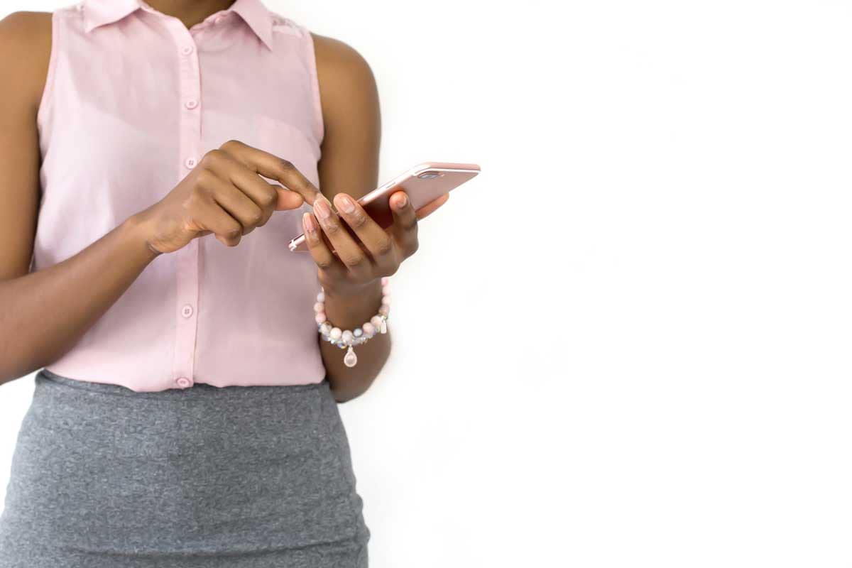 Person using smartphone to download Canada’s best mortgage and real estate calculator app