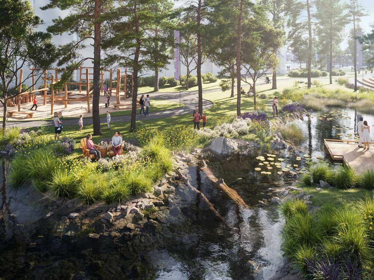 Landscaped park space with walking paths, water features, playgrounds, and natural greenery within a master-planned Burnaby residential community, showcasing Burnaby presale condos and Burnaby new construction homes for sale.