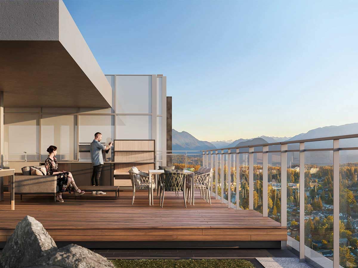 Rooftop terrace at a Coquitlam presale condo featuring outdoor seating, modern design, and panoramic mountain views, highlighting lifestyle amenities in new construction homes.