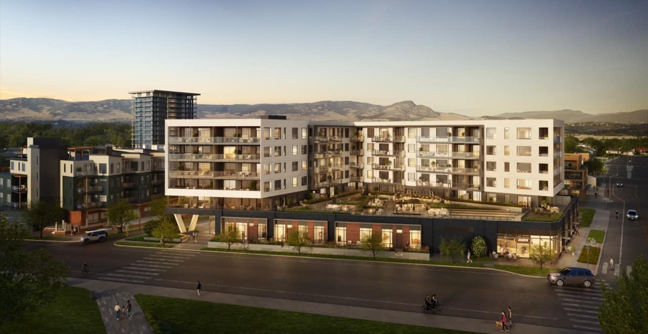 Exterior rendering of Alma Kelowna by Mission Group showing terraces and park-facing homes.