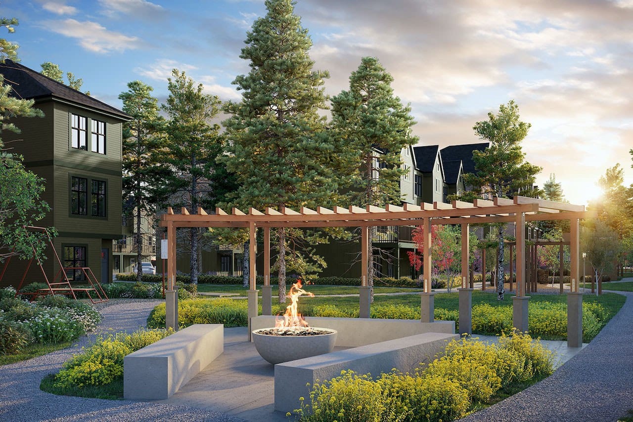 Outdoor courtyard with pergola and fire pit at The Loop South Surrey by Gramercy Developments