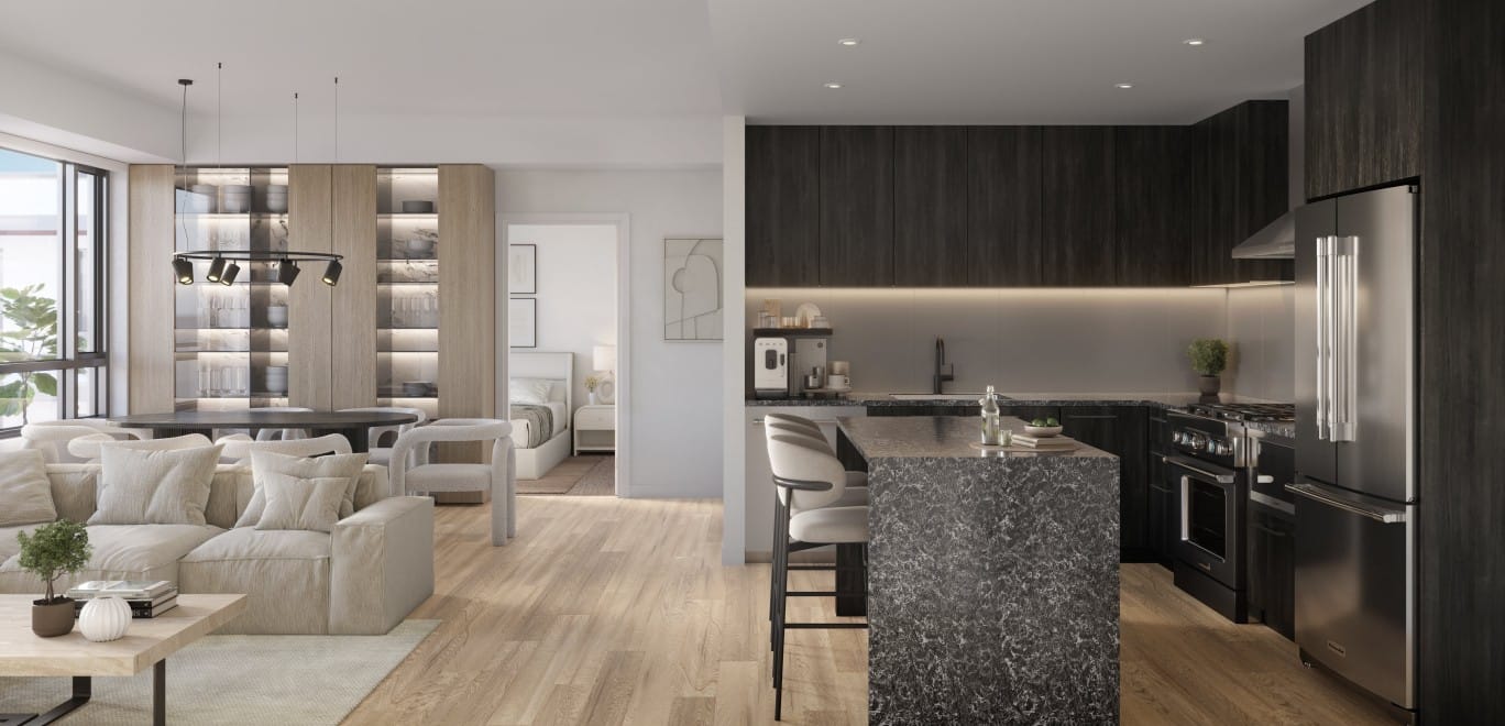 Dusk colour scheme kitchen at Alma Kelowna with dark cabinetry and premium appliances.