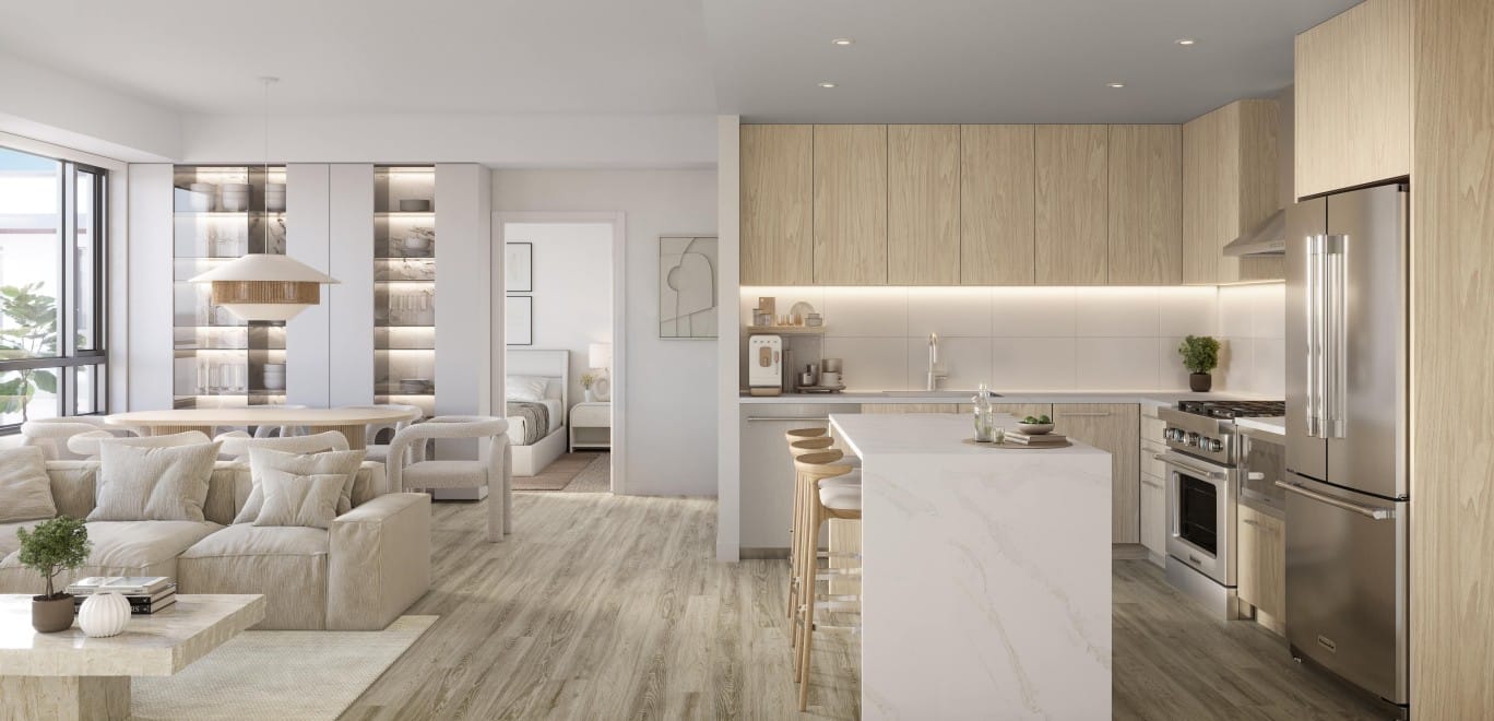 Open-concept Dawn interior at Alma Kelowna with bright cabinetry, dining area and modern appliances.