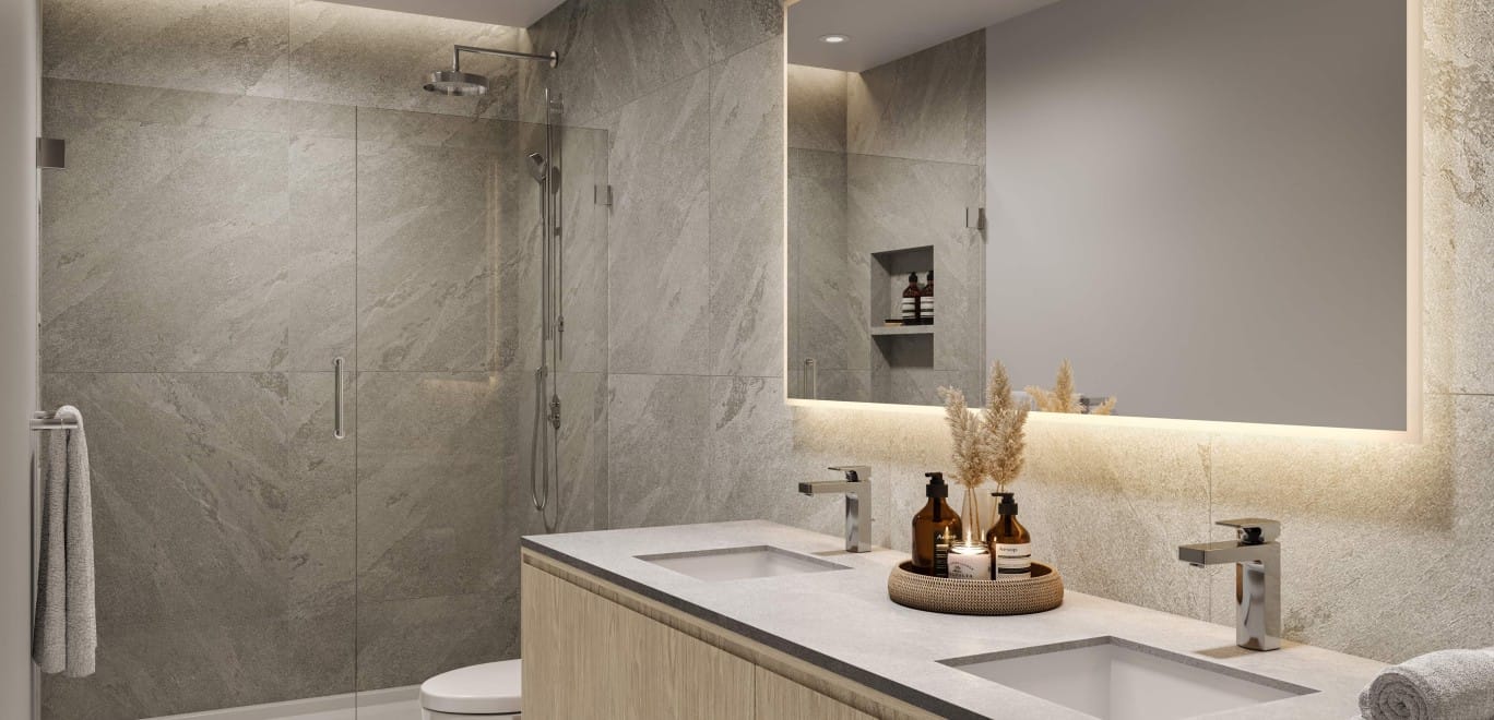 Dawn colour scheme primary bathroom at Alma Kelowna with walk-in shower and soft lighting.