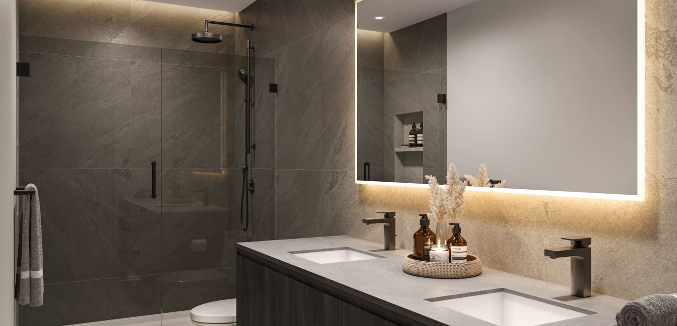 Dusk colour scheme primary bathroom at Alma Kelowna with double vanity and LED-lit mirror.