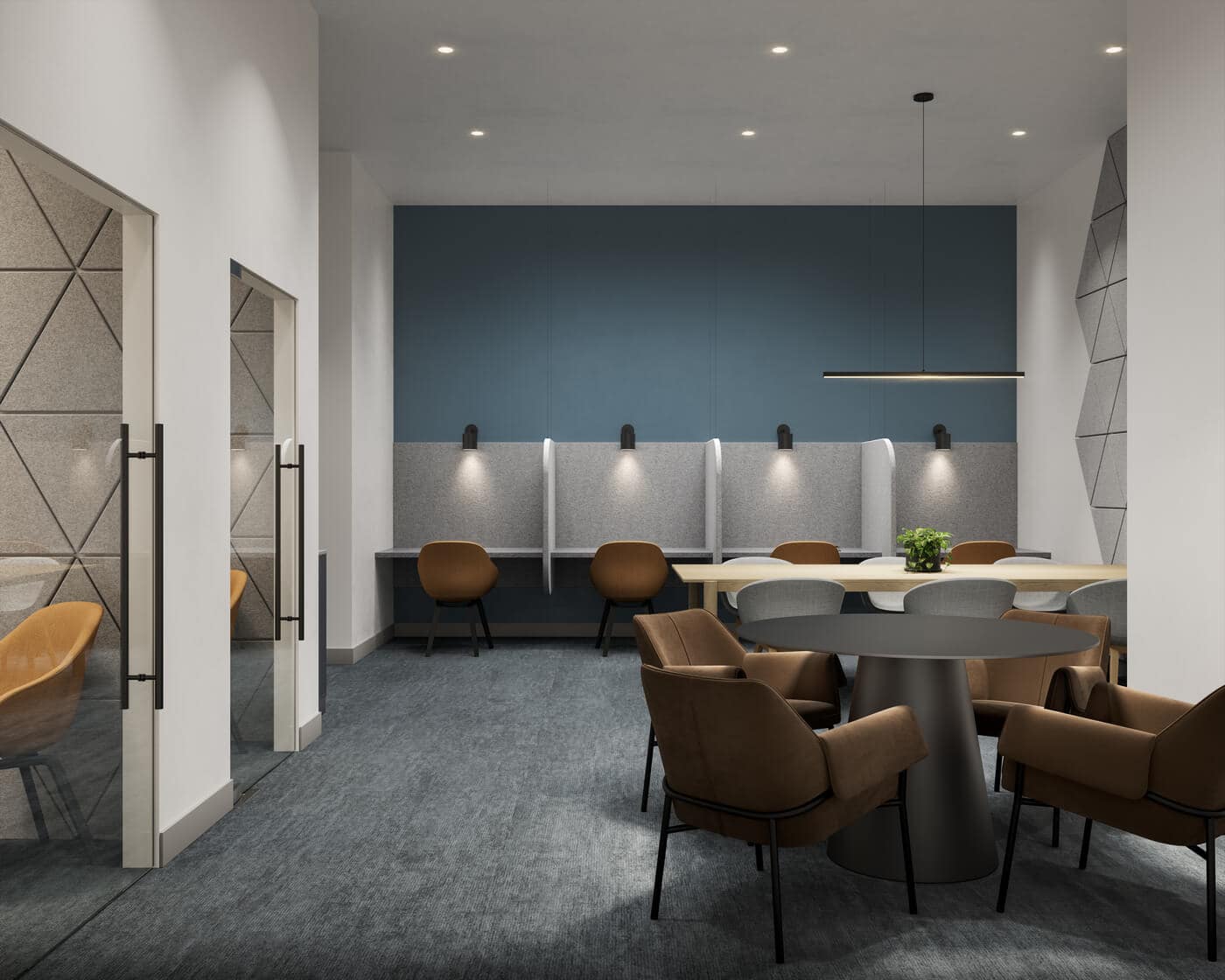 Co-working and meeting area at Jericho Park Langley by Essence Properties featuring private workstations, tables, seating, and modern office-inspired interiors at 19925 78B Avenue.