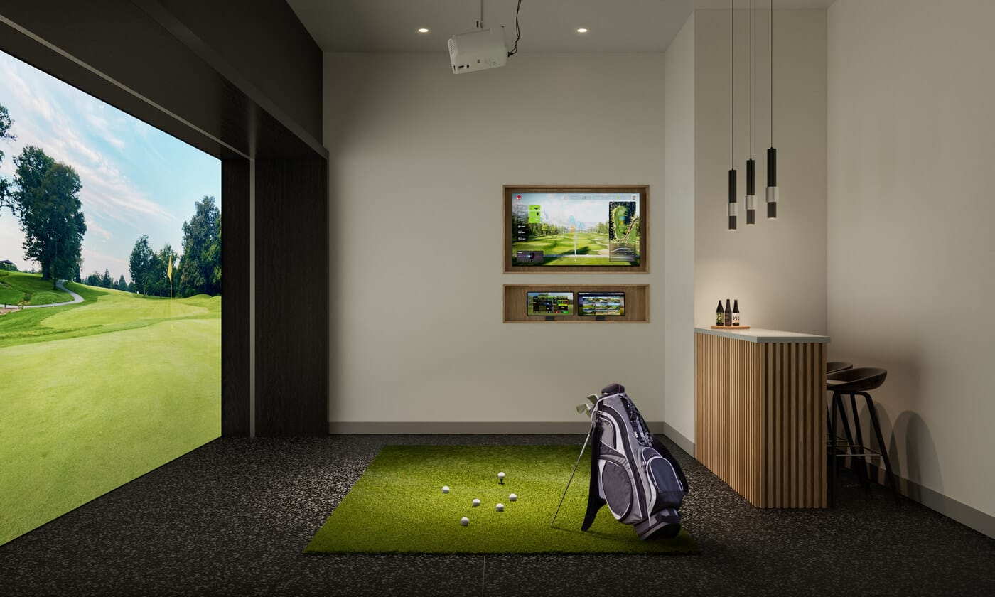 Indoor golf simulator amenity at Jericho Park Langley by Essence Properties featuring virtual golf setup, lounge bar area, and entertainment space at 19925 78B Avenue.