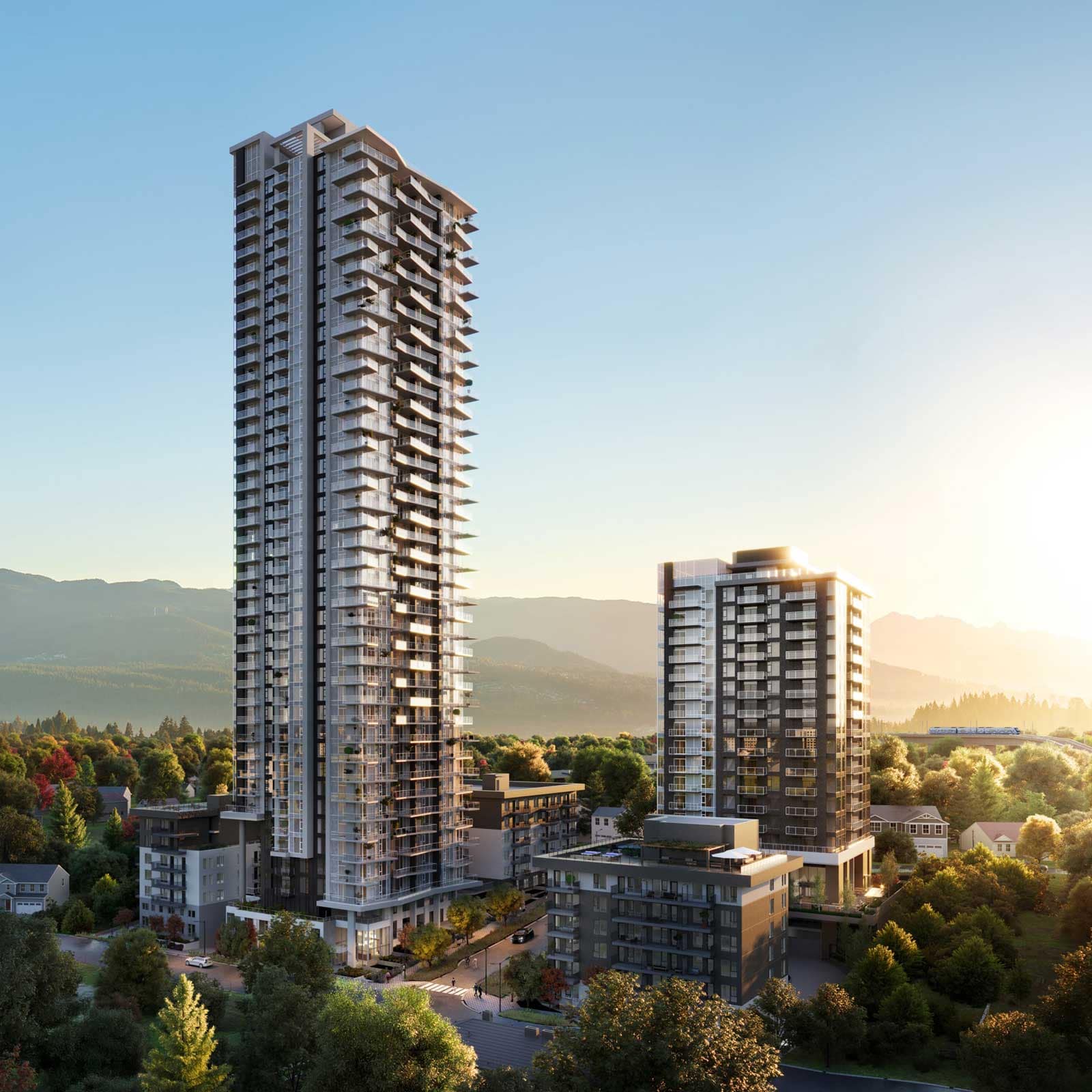Modern high-rise Coquitlam presale condos surrounded by residential neighbourhoods and mountain views, showcasing new construction homes and transit-oriented development in Coquitlam.