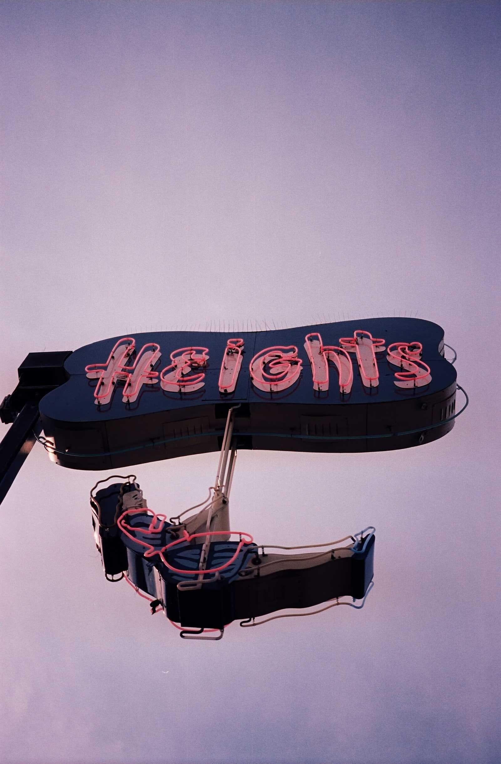 Neon sign reading The Heights in Burnaby, highlighting the vibrant neighbourhood lifestyle surrounding Centrale Burnaby near 4488 Hastings Street in Capitol Hill.