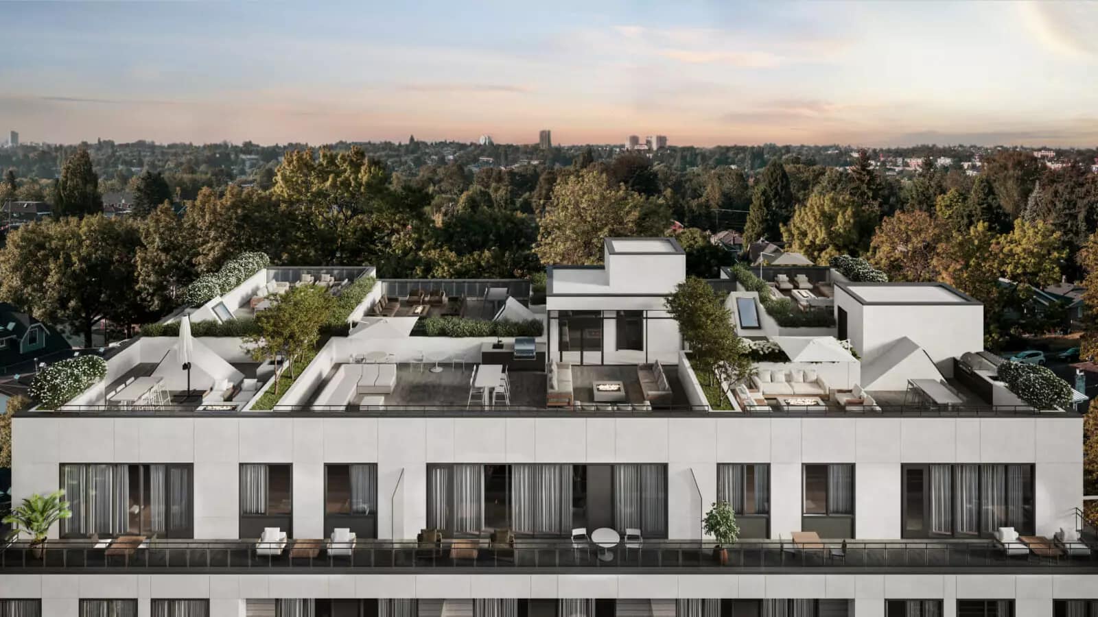 Private rooftop terrace and outdoor lounge spaces at Linx East Vancouver featuring landscaped seating areas, fire tables, and panoramic neighbourhood views from 2268 East Broadway.