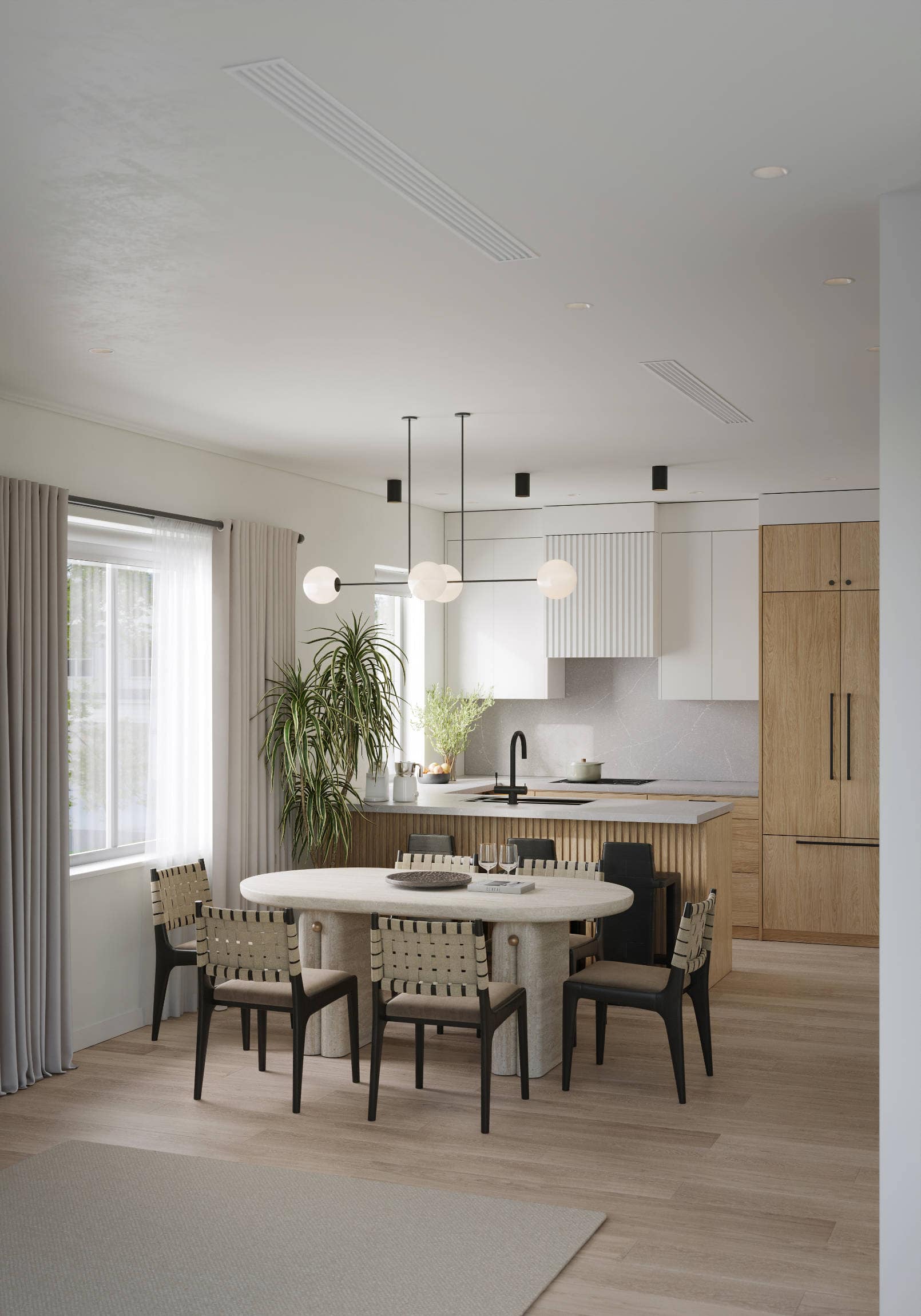 Modern kitchen at Quintet Vancouver East featuring a large island, integrated appliances, natural wood finishes, and contemporary pendant lighting by THT Properties.