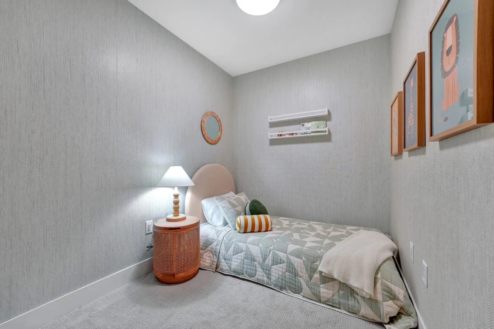 Compact secondary bedroom at Jethro Langley Langley City featuring single bed, neutral tones, and efficient layout in a Whitetail Homes development