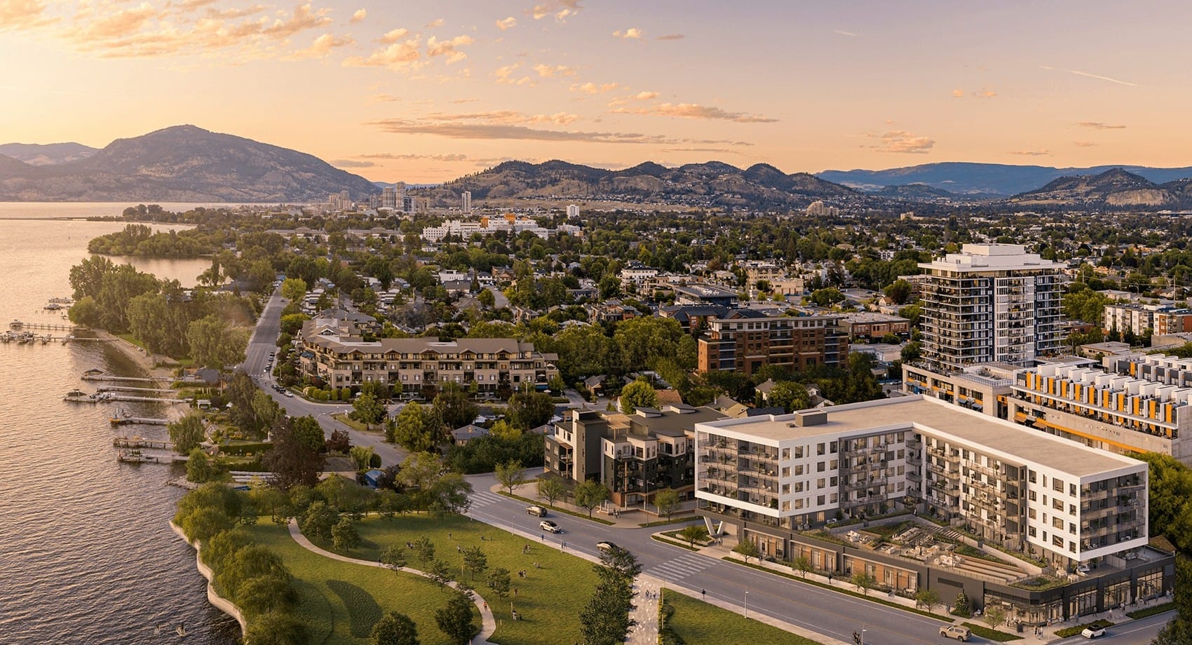 Aerial view of Alma Kelowna by Mission Group at 3051 Abbott Street beside Pandosy Waterfront Park and Okanagan Lake.