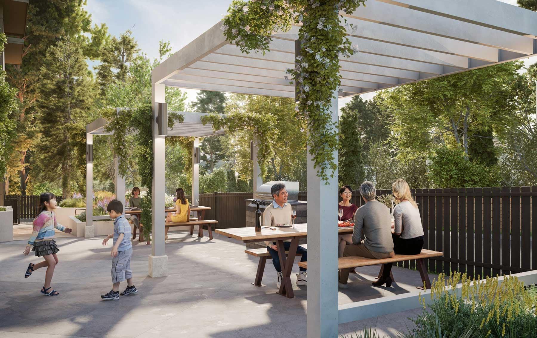 Landscaped courtyard at Harriswood Coquitlam by Domus Homes featuring seating area, garden planters, mature trees, and peaceful outdoor space in Coquitlam West at 611 Harrison Avenue