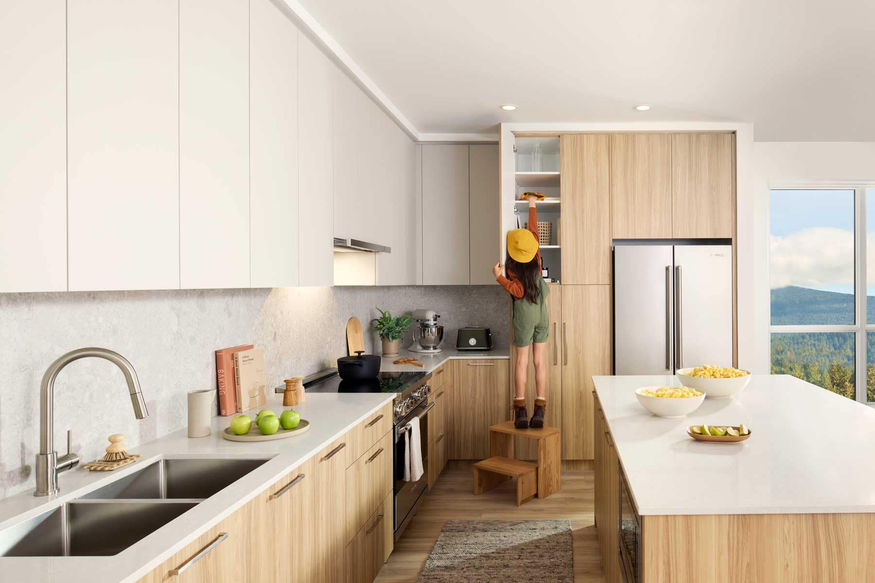 Spacious family kitchen interior at Trailside at Lynn in North Vancouver featuring wood cabinetry, oversized island, premium appliances, and open-concept design by Mosaic at 2380 Emery Court.