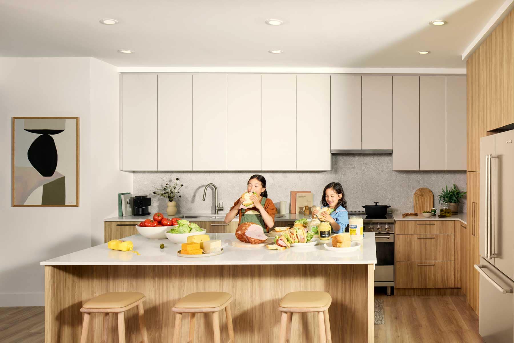 Contemporary kitchen at Trailside at Lynn by Mosaic in North Vancouver featuring a large island, integrated cabinetry, premium finishes, and bright open layout at 2380 Emery Court.