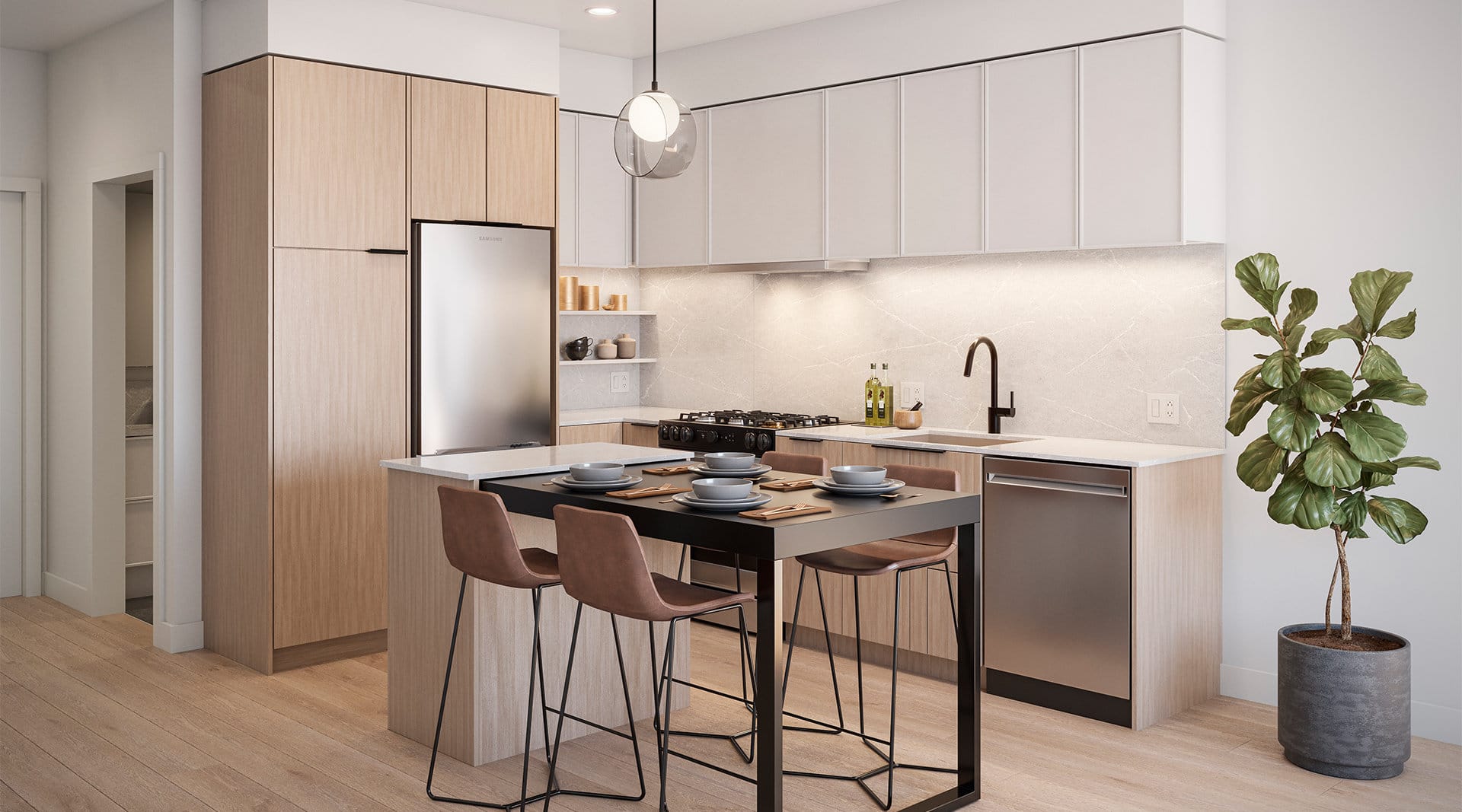 Light colour scheme kitchen interior at Spera presale development in Surrey Newton by Peterson Group at 8293 King George Blvd, showcasing light wood tall pantry and lower cabinets, matte white upper cabinets, quartz countertop and full-height quartz backsplash, stainless steel appliances, gas cooktop, modern black faucet, pendant lighting, and a functional island dining area in a bright open-concept space.