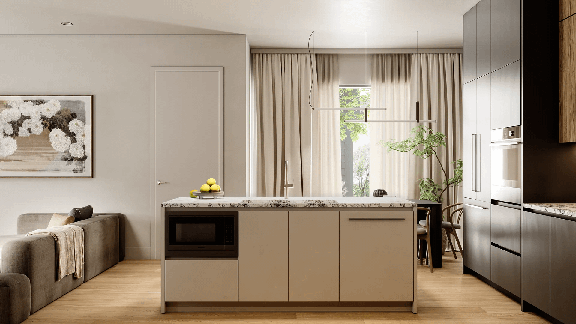 Modern kitchen at Ansoku Vancouver featuring a large island, integrated appliances, stone countertops, and open-concept design by Lightwell Homes at 5032 Granville Street in Vancouver.