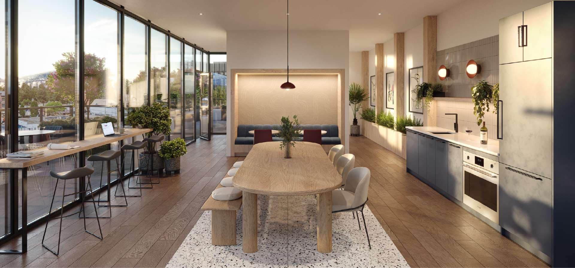 Livy Port Coquitlam indoor social lounge with kitchen, dining area and large windows at 2245 McAllister Avenue