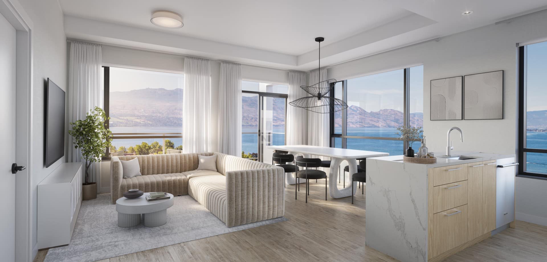 Living and dining space at Alma Kelowna with panoramic Okanagan Lake views from floor-to-ceiling windows.