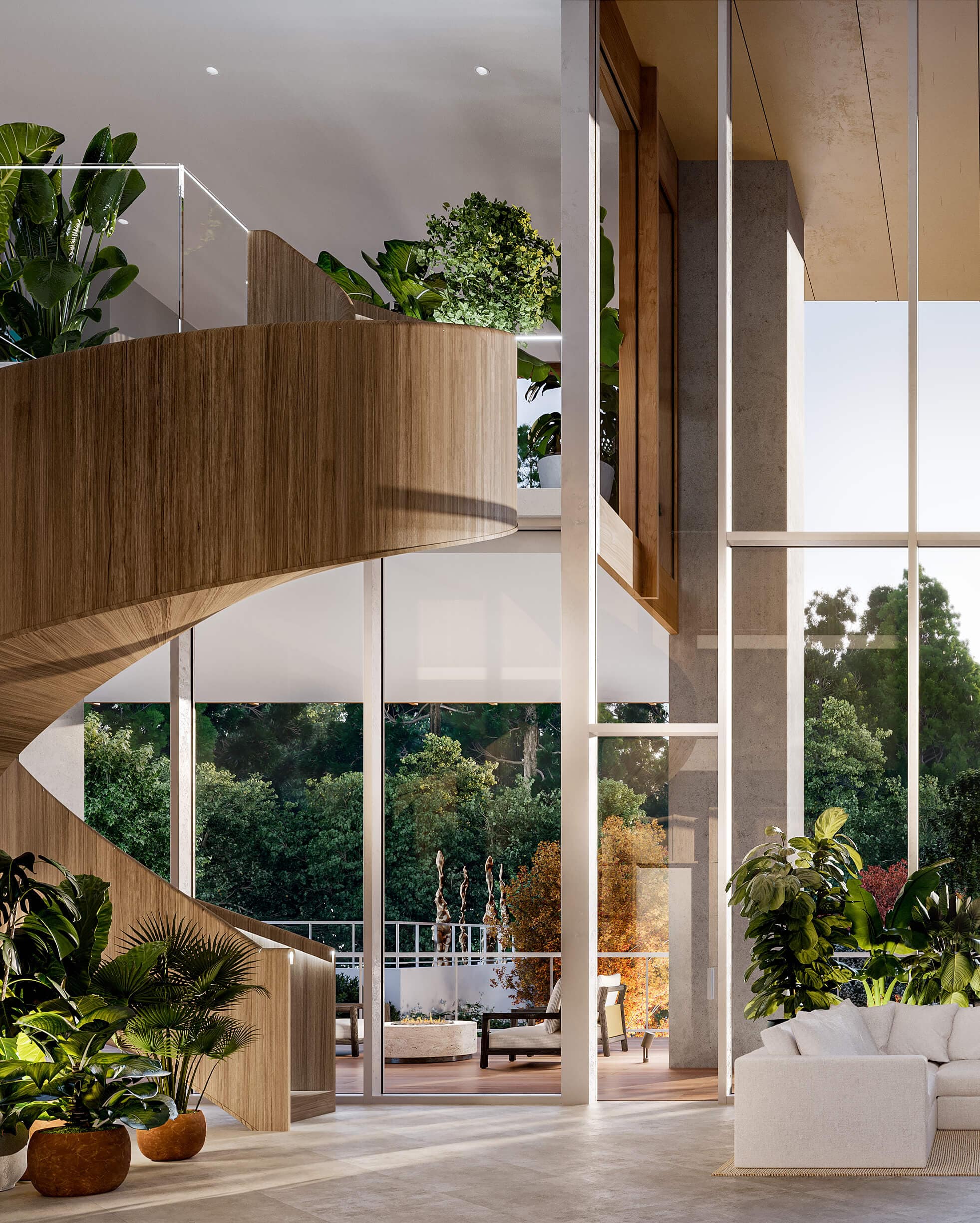 Grand double-height lobby with curved wood staircase and lush greenery at Ironwood Coquitlam