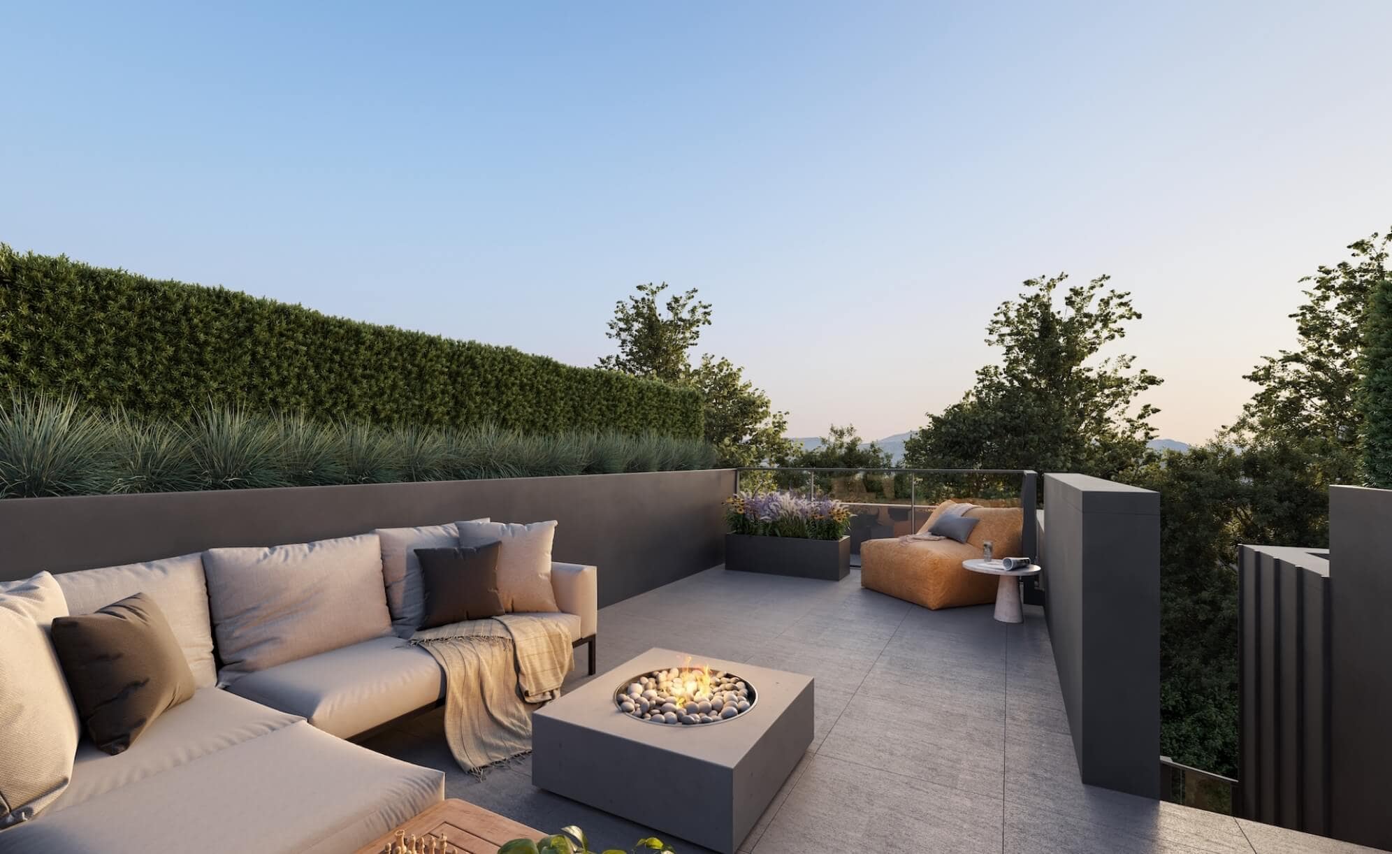 Private rooftop terrace at York Vancouver by Listrator in Vancouver’s Cambie Corridor, featuring outdoor lounge seating, fire table, landscaped planters, and elevated views from a townhome at 802 West 37th Avenue.