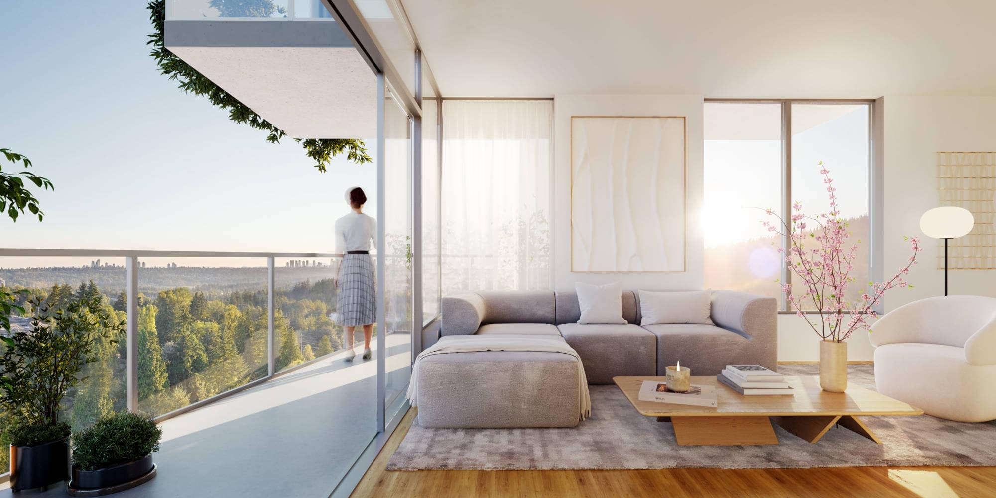 Bright living room at Gardena Coquitlam by Intracorp at 635 Gardena Drive, showcasing floor-to-ceiling windows, soft neutral finishes, modern furnishings, and a private balcony with expansive views over Burquitlam and surrounding greenery.