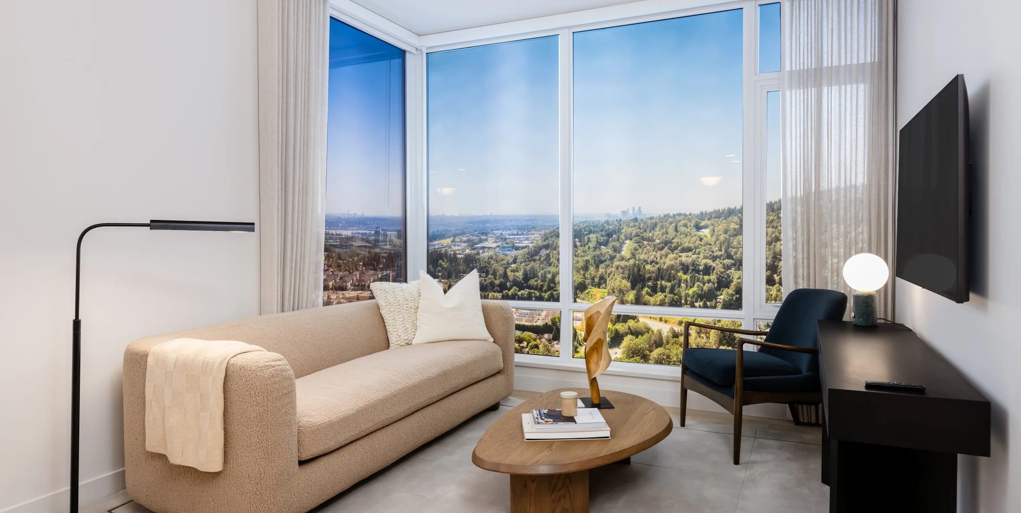 Modern Ironwood Coquitlam living room with panoramic valley and city views