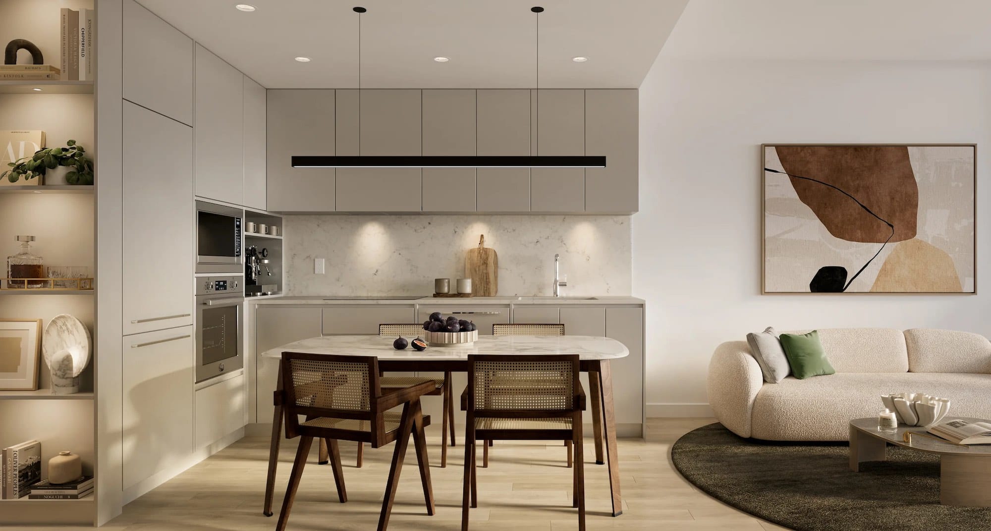Contemporary kitchen and dining area with marble backsplash and warm lighting at Ironwood Coquitlam