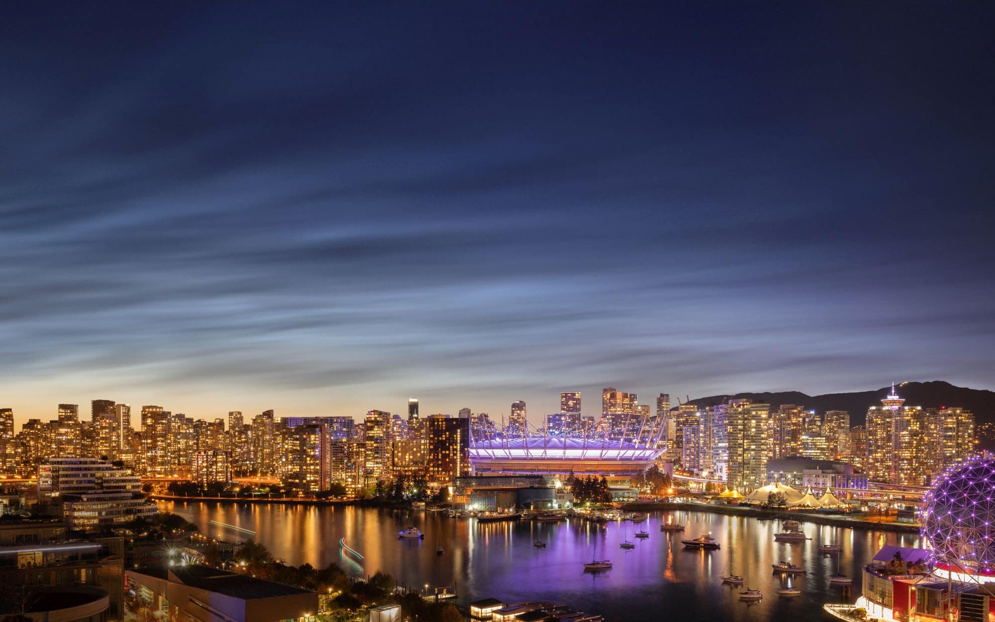 Night view of Vancouver skyline and BC Place from Tesoro False Creek