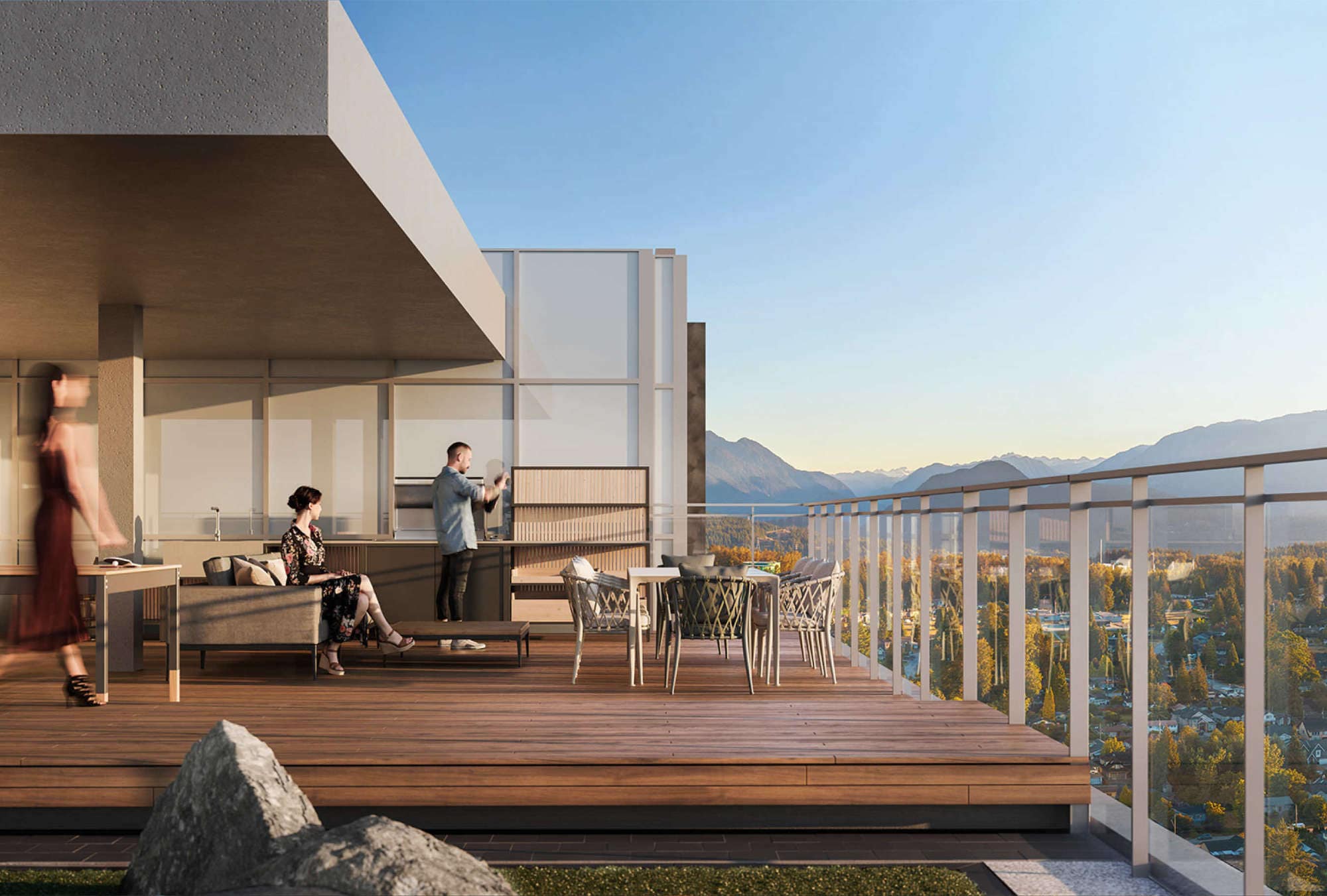 Rooftop terrace at Gardena Coquitlam by Intracorp located at 635 Gardena Drive, featuring outdoor dining, lounge seating, expansive views of mountains and city, and contemporary design for elevated living in Burquitlam.