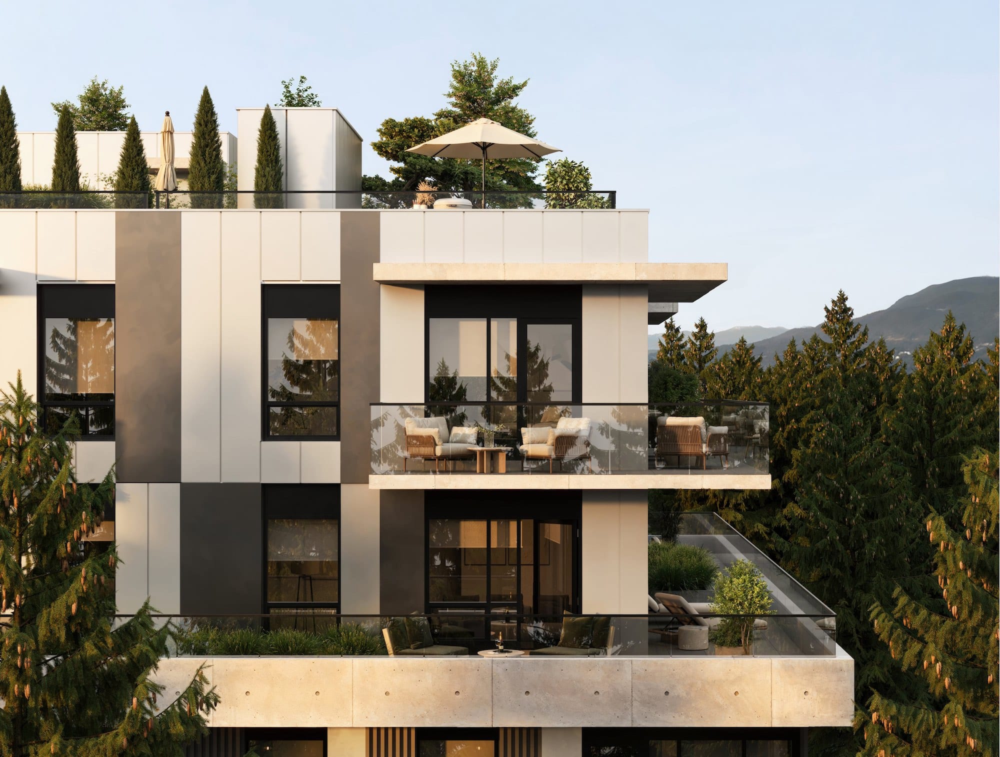 Private balcony and rooftop terrace views at Arden Vancouver overlooking trees and mountains.