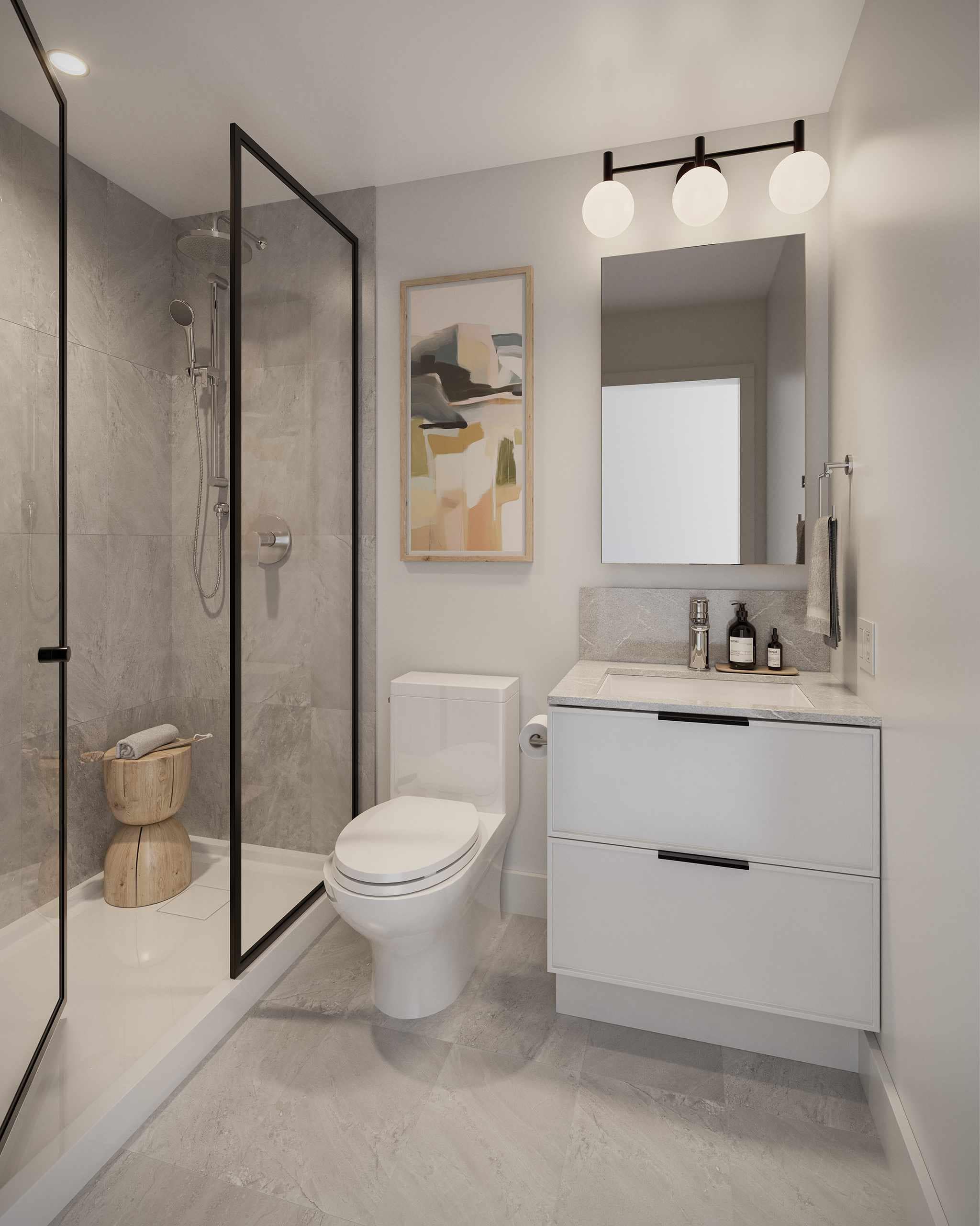 Modern bathroom interior at Spera presale development in Surreyโs Newton neighbourhood by Peterson Group at 8293 King George Blvd, featuring large-format tile floors and shower surround, glass-enclosed shower with black metal trim, rainfall shower head, floating vanity with quartz countertop and integrated sink, wide mirror, contemporary globe vanity lights, and a clean minimalist design.