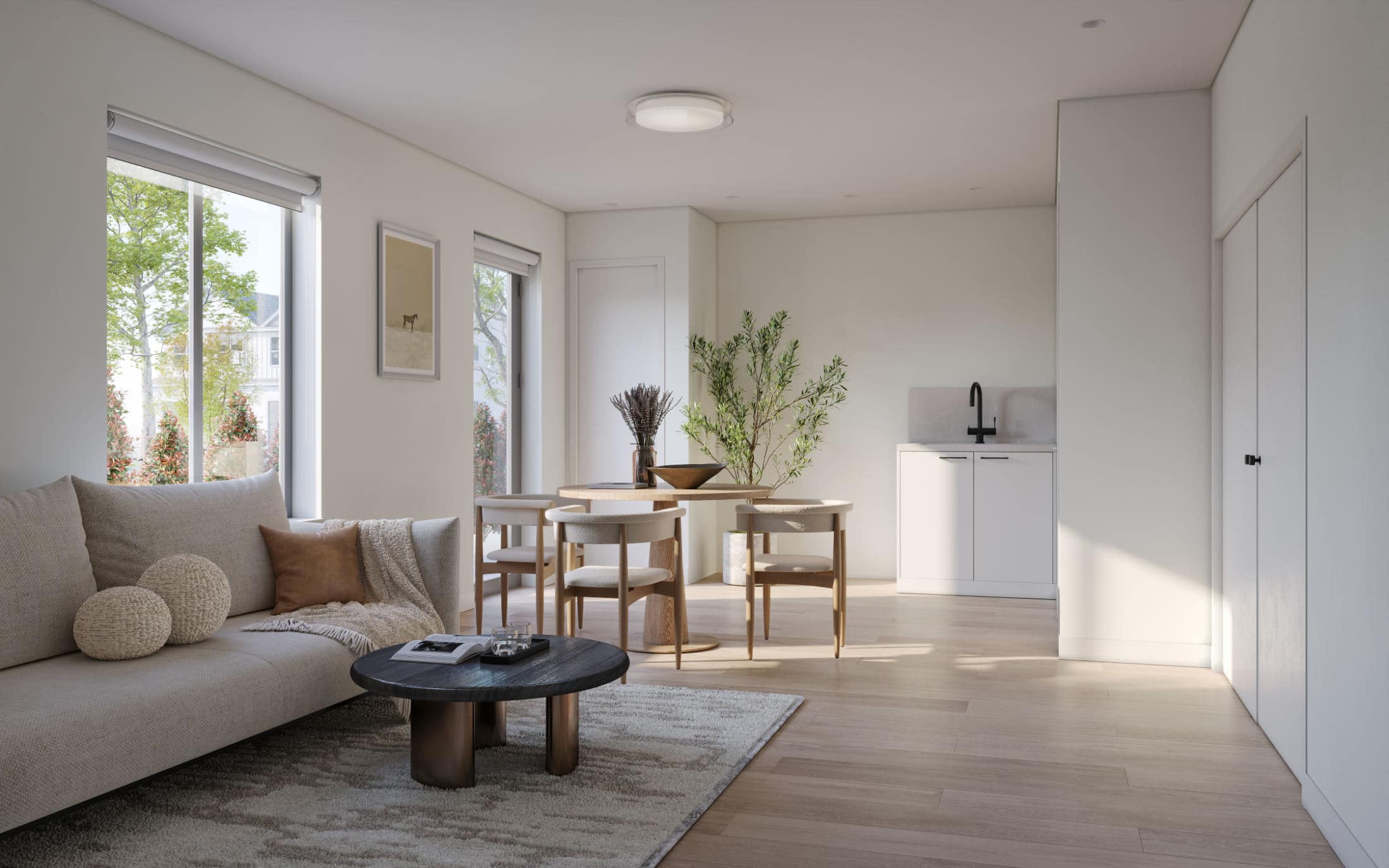 Ground-level living and dining area at Quintet Vancouver East with large windows, natural wood flooring, minimalist finishes, and flexible layout by THT Properties in Vancouver East.