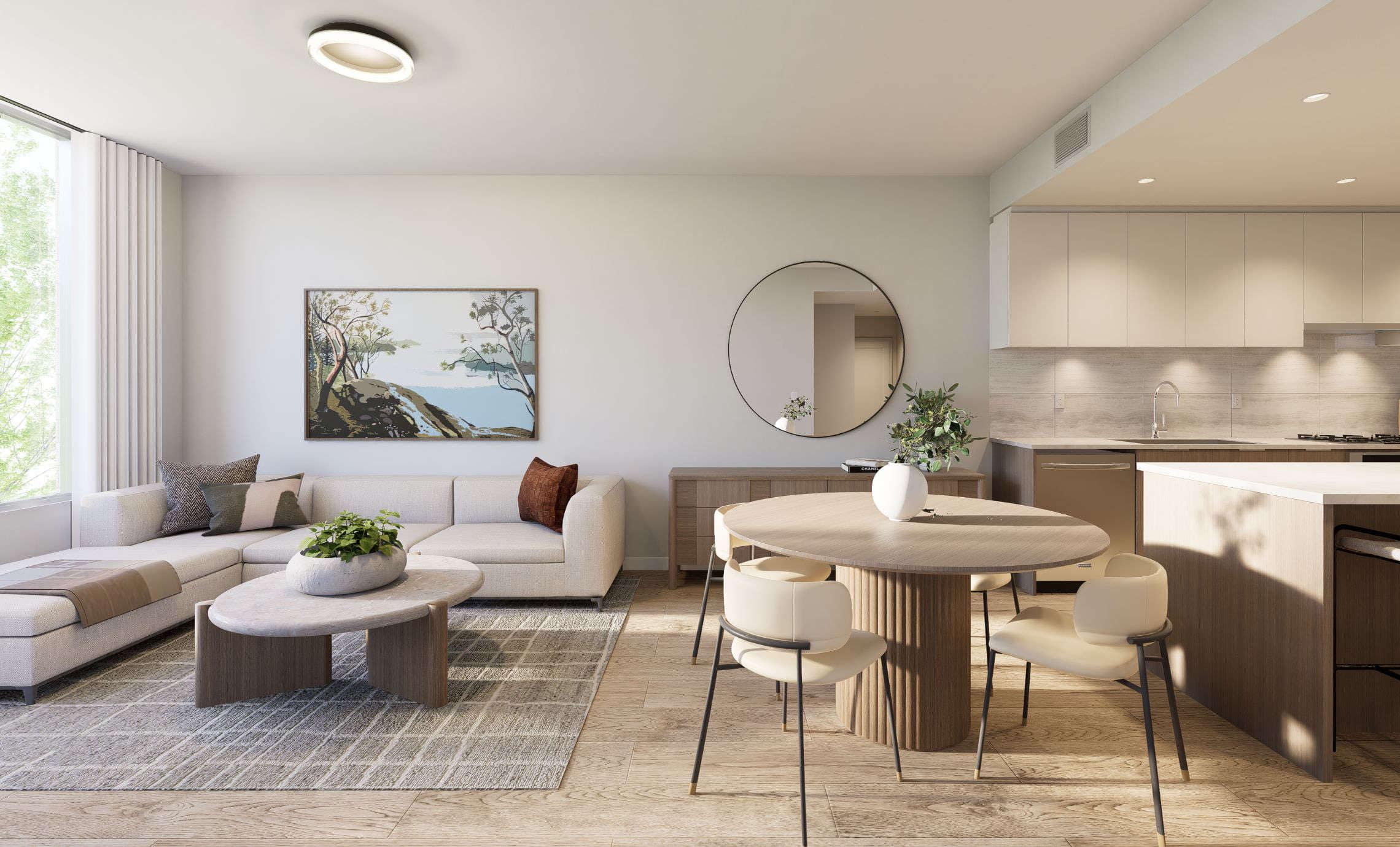 Open-concept living, dining, and kitchen interior at Goldfinch presale condos in Coquitlam West by Polygon, featuring wide-plank flooring, contemporary cabinetry, integrated kitchen island, and large windows bringing in natural light.