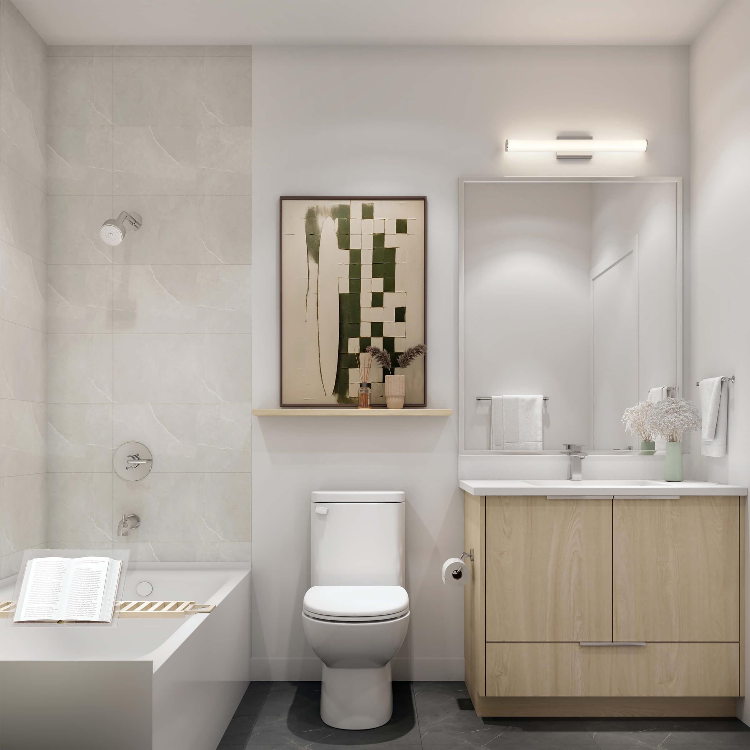 Modern bathroom at Harlowe South Surrey by Genaris Properties featuring a light wood vanity, integrated lighting, large-format tile, and contemporary fixtures.