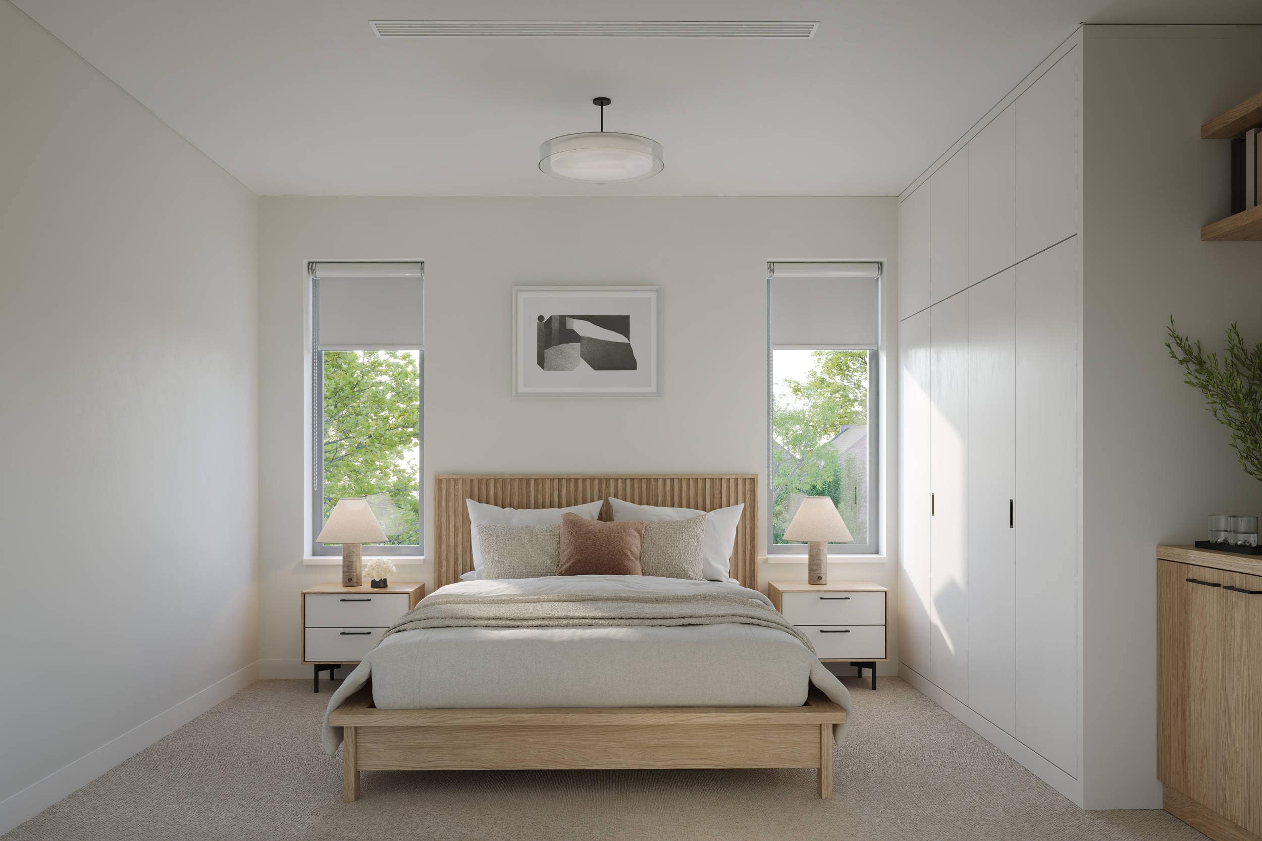 Primary bedroom at Quintet Vancouver East featuring floor-to-ceiling windows, custom built-in wardrobes, soft neutral finishes, and Scandinavian-inspired design by THT Properties.