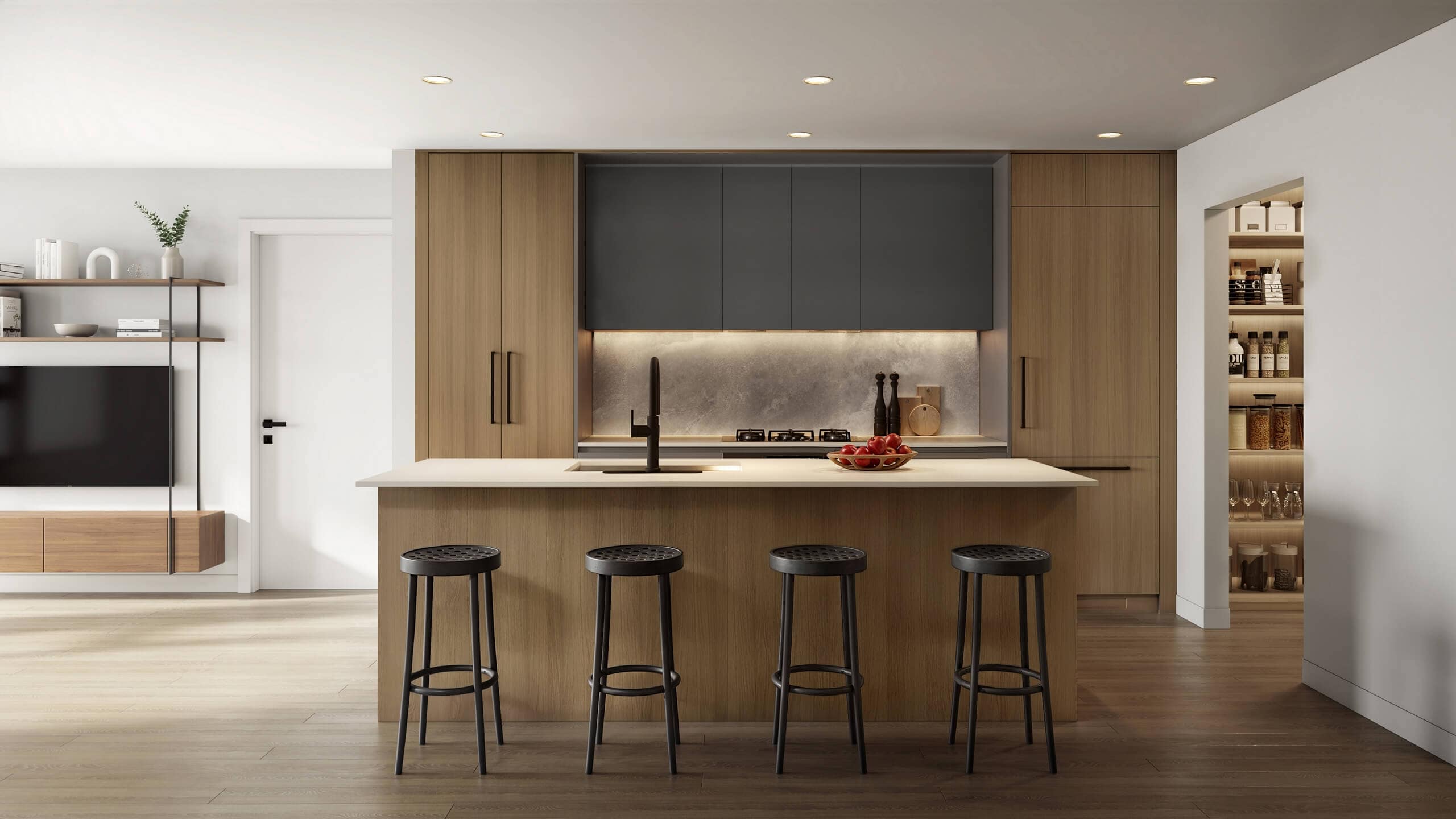 Modern kitchen interior at Centrale Burnaby by FirstTrack Development featuring a large island with seating, integrated wood cabinetry, stone backsplash, and contemporary lighting at 4488 Hastings Street in Burnaby’s Capitol Hill neighbourhood.