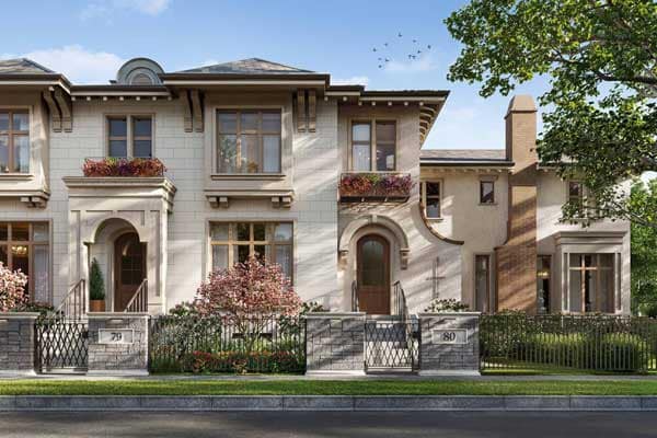 Detailed streetscape rendering of Arbutus Shaughnessy, a luxury presale townhome development by Cressey at 4683 Arbutus Street in Vancouver’s prestigious Shaughnessy neighbourhood. The scene features a row of sophisticated townhomes with arched doorways, brick and stone exterior accents, decorative window planters, and landscaped gardens behind wrought-iron fencing. Mature street trees and a quiet residential sidewalk frame the development, emphasizing the refined character of the Arbutus Shaughnessy community. The architecture blends classic European-inspired detailing with contemporary craftsmanship, reflecting the premium positioning of this Shaughnessy presale project in Vancouver.