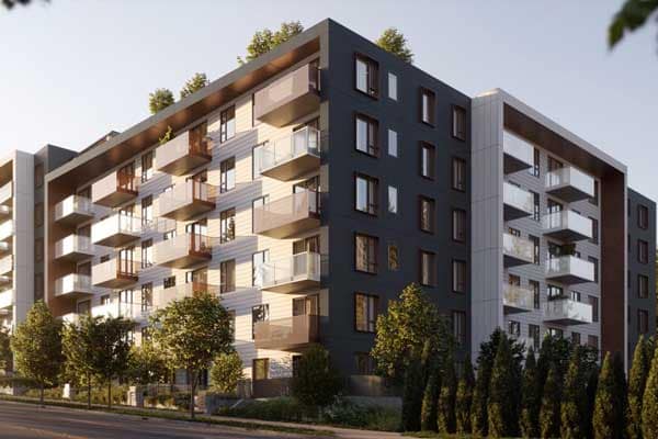 Exterior architectural view of Soenhause Coquitlam, a presale condominium development by Marcon located at 712 Como Lake Avenue in Coquitlam. The mid-rise residential building features contemporary architecture with contrasting dark and light exterior materials, expansive glass balconies, landscaped street frontage, and modern residential design. The image highlights the stylish façade and urban streetscape planned for the Soenhause Coquitlam community.
