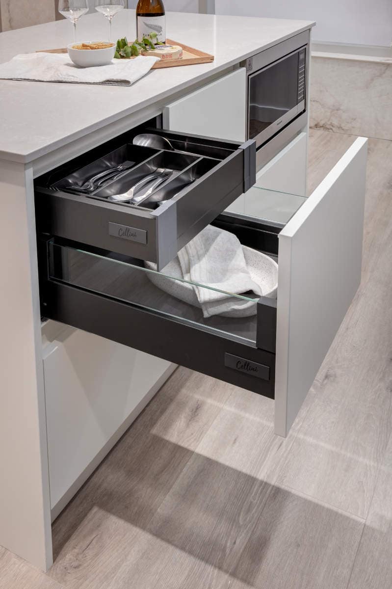 Kitchen drawers with cutlery and storage organization at Artesia Metrotown Burnaby