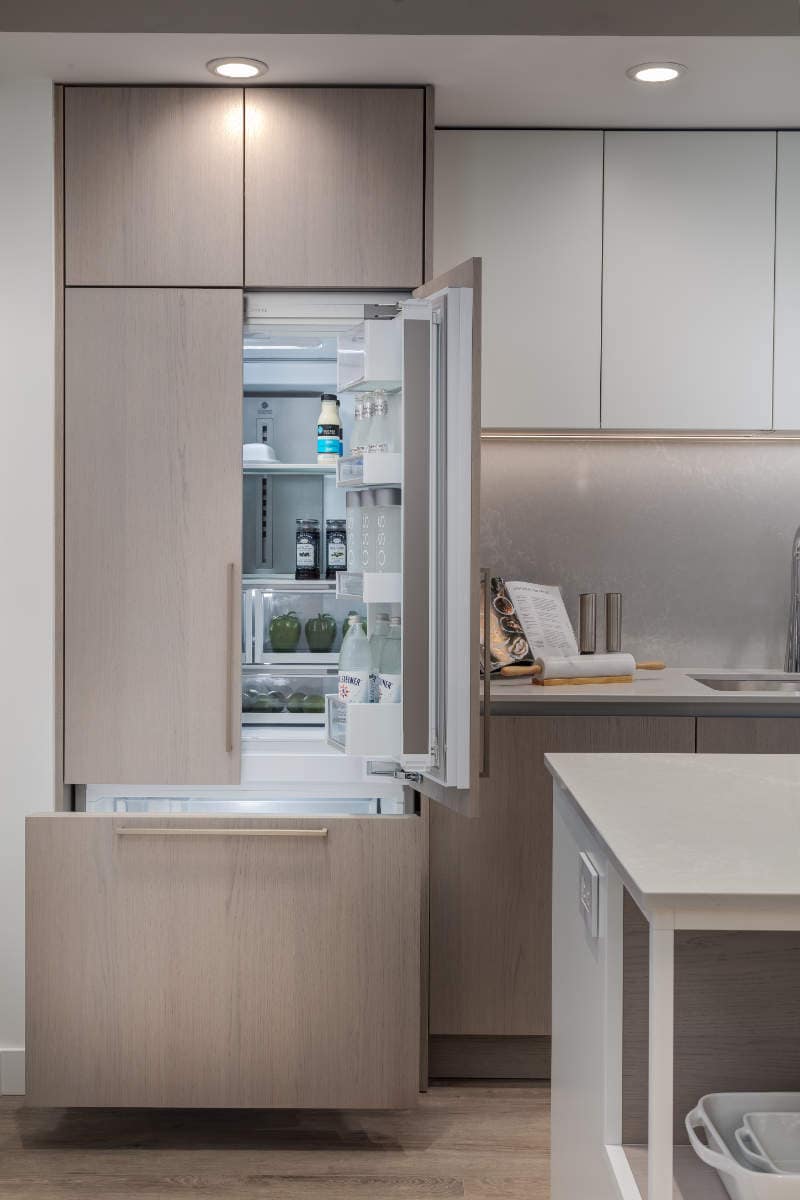 Built-in panelled refrigerator in modern kitchen at Artesia Metrotown Burnaby