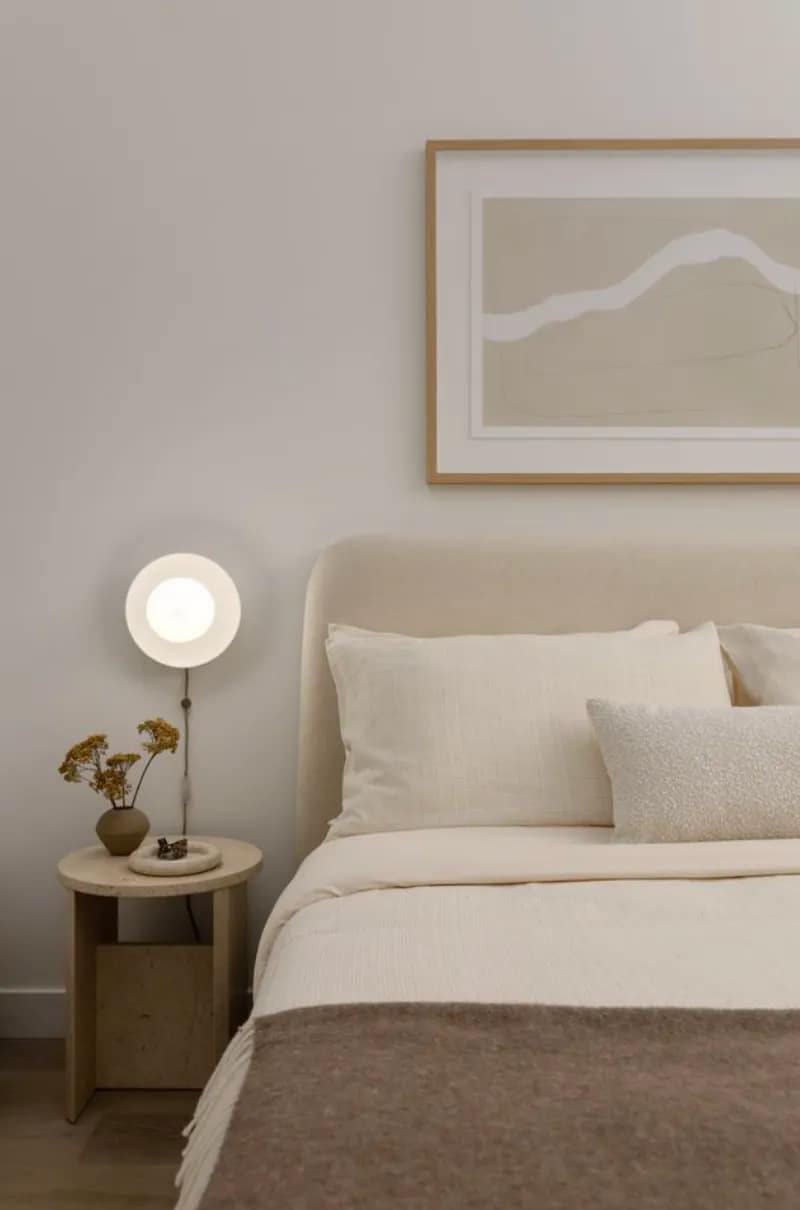 Minimalist bedroom interior at Linx East Vancouver featuring soft neutral finishes, contemporary furnishings, and calming modern design by Lotus Capital and Omicron at 2268 East Broadway.