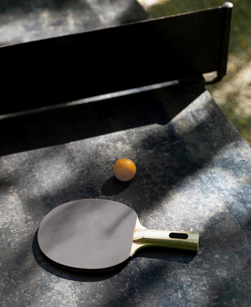 Table tennis setup within a recreational amenity space at Encore Coquitlam, highlighting active lifestyle amenities offered by Beedie Living at 2 King Edward Street in Coquitlam.