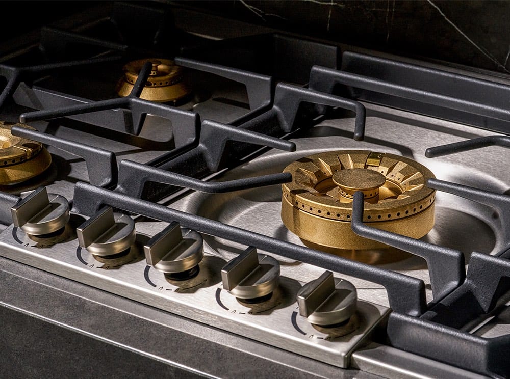 Gaggenau gas cooktop with brass burners in Tesoro Vancouver kitchen