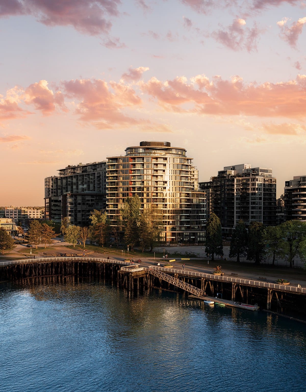 Tesoro Vancouver waterfront exterior at sunset overlooking False Creek