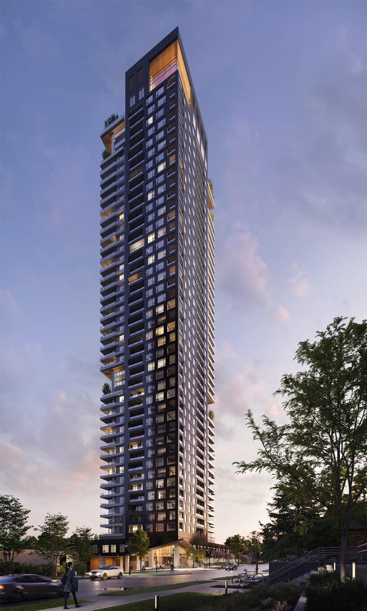 Exterior tower of Band Coquitlam presale condos at dusk